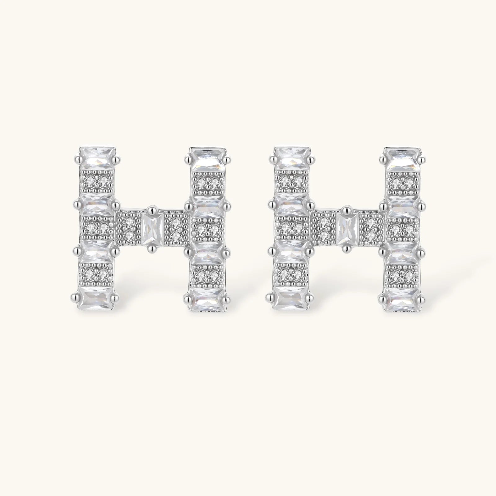 Letter H jewelry set featuring geometric crystal design in gold and white gold plated finish with adjustable chain necklace